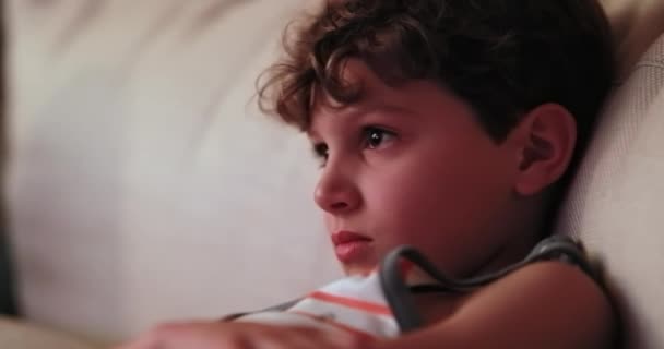 Child Watching Screen Portrait Close Young Boy Staring Screen Night — Vídeo de stock