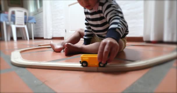Toddler Boy Playing Car Toys Indoors Home — Stock videók