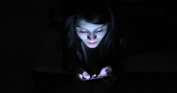 Woman Face Looking Cellphone Screen Pitch Blackness Blue Screen Glow — ストック動画