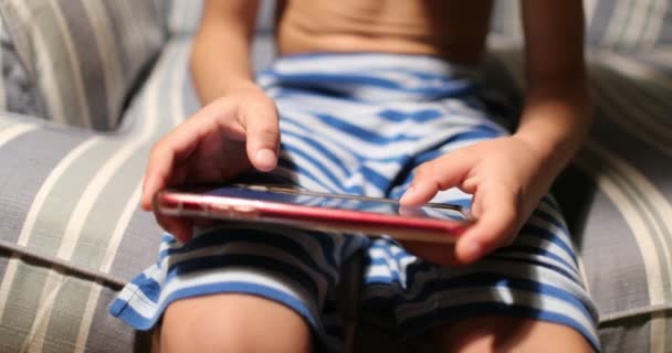 Kid Hands Holding Cellphone Device Touching Screen Playing Video Game — Stok video