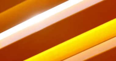 Yellow orange light lens-flare patterns background effect
