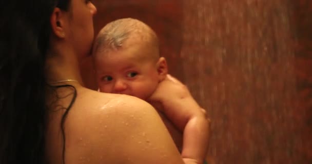 Mother Baby Shower Holding Washing Newborn Baby — Stock video