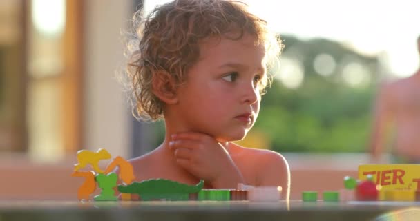 Toddler Infant Boy Thinking Trying Figure Out Puzzle — Vídeos de Stock