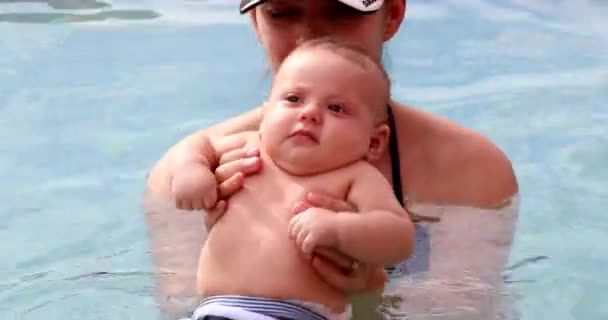 Mother Holding Newborn Baby Son Water — Vídeos de Stock