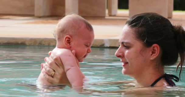 Mother Baby Together Swimming Pool Water Candid Interaction Infant Mom — Stock Video