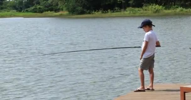 Young Boy Lake Fishing Child Outdoor Leisure Activity — Stock video