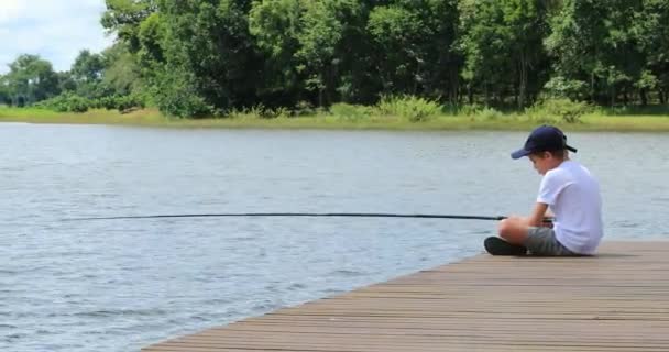 Young Boy Lake Fishing Child Outdoor Leisure Activity — Stock video