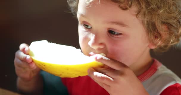Small Child Taking Bite Melon Fruit Toddler Eating Fruit Wiping — Vídeo de Stock