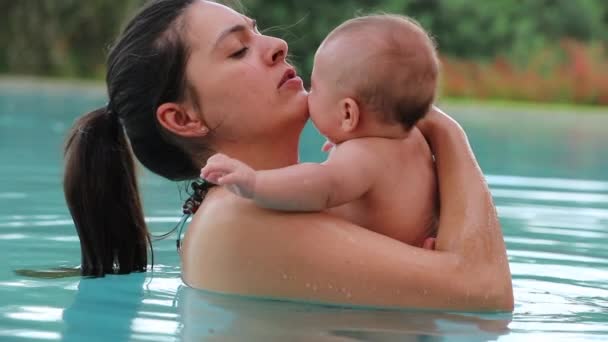 Mother Holding Baby Newborn Month Old Swimming Pool — Stockvideo