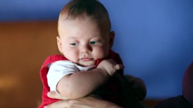 Cute baby face adorable four month old newborn learning