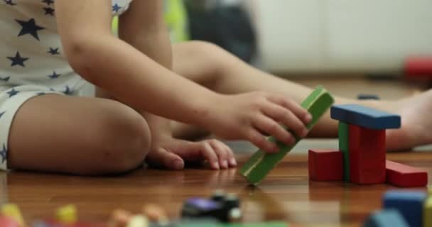 Child Playing Toys Bedroom Constructing Wooden Pieces — Stockvideo