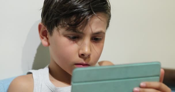 Kid Watching Content Tablet Screen — Stockvideo