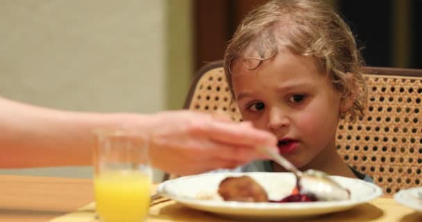 Mother Feeding Her Little Boy Son Dinner Supper — Stockvideo
