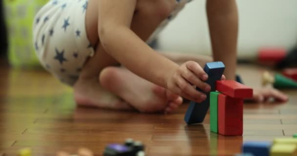 Candid Little Boy Playing Toys Bedroom Evening Wearing Pajamas — Wideo stockowe