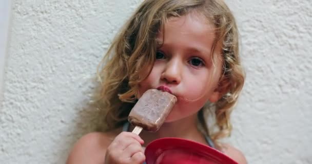 Cute Adorable Little Girl Eating Chocolate Ice Cream Snack — Wideo stockowe