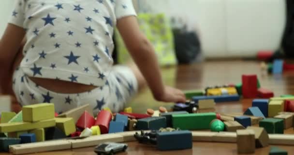 Happy Toddler Boy Bedroom Night Wearing Pajamas Playing Toys Feeling — Stockvideo