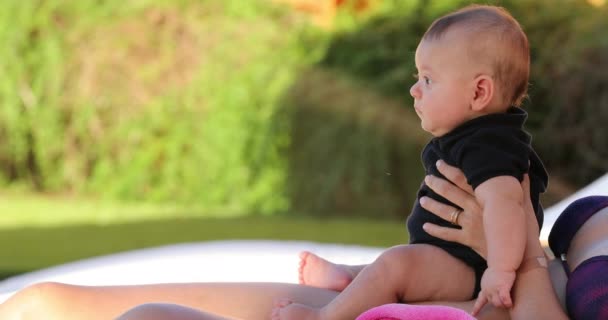 Mom Holding Baby Son Poolside Outdoors — ストック動画