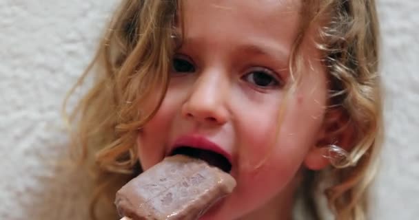 Cute Adorable Little Girl Eating Chocolate Ice Cream Snack — Wideo stockowe