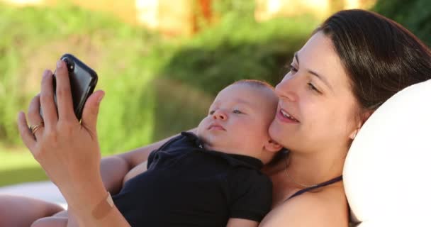 Mother Taking Selfie Baby Infant Pool — Stockvideo