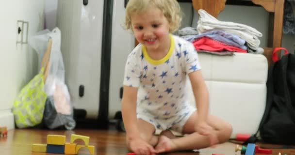 Happy Cute Candid Toddler Playing Toys Evening Wearing Pajamas — Stock video