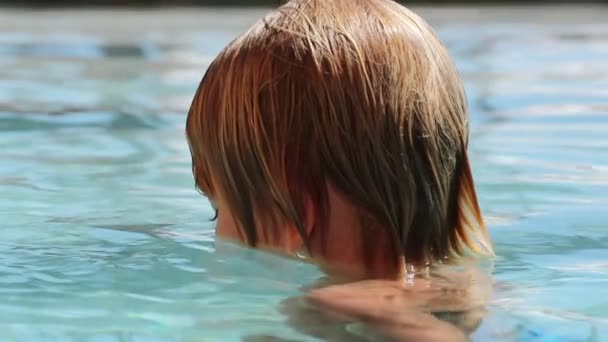 Candid Child Playing Swimming Pool Water Himself — Stock Video