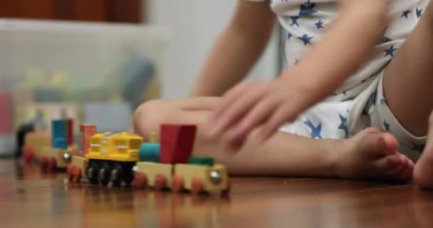 Little Kid Hands Playing Wooden Car Toys Making Automobile Crash — Vídeo de Stock