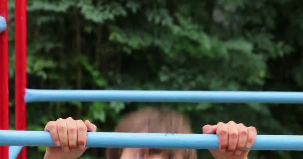 Young Boy Playing Monkey Bars — Video Stock