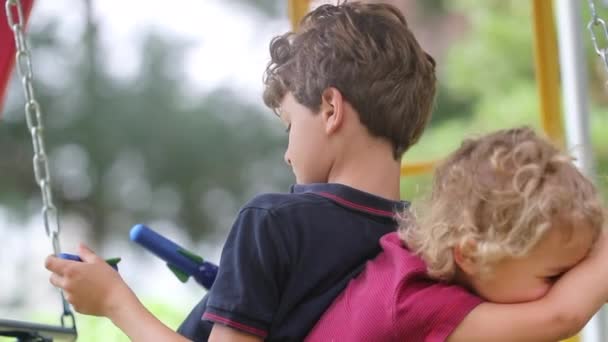 Kids Playing Playground Swing Authentic — Stockvideo