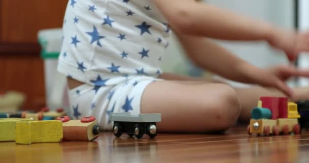 Little Kid Hands Playing Wooden Car Toys Making Automobile Crash — Stockvideo