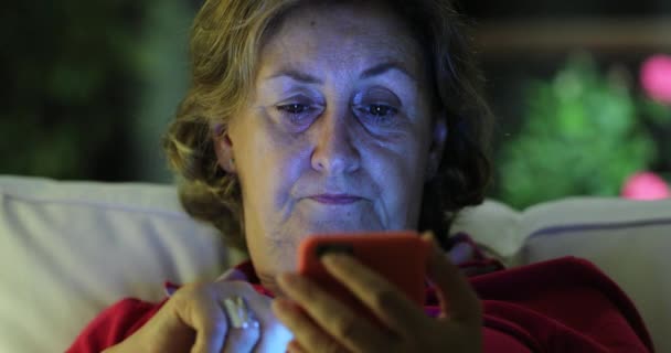 Senior Woman Holding Cellphone Device Touching Screen Evening — Stockvideo