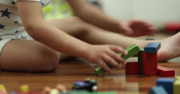 Toddler Playing Toys Bedroom Night Wearing Pajamas Contructing Wooden Puzzle — Stockvideo