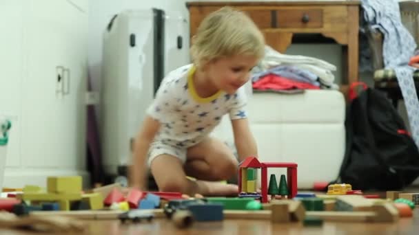 Child Playing Toys Messy Room Alone — Wideo stockowe