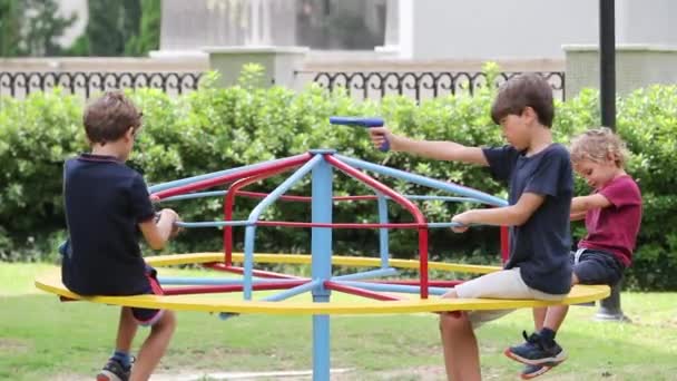 Kids Playing Playground Carousel Spinning — Video