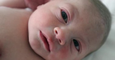 Newborn baby boy at hospital first day of life