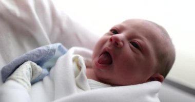 Newborn baby infant after birth first day of life