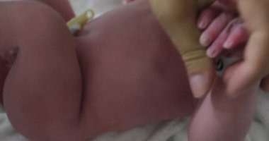 Newborn baby crying at hospital first hours of life
