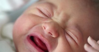 Cute newborn baby infant crying