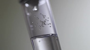 Slow-motion saline IV drip