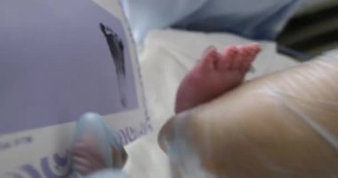 Registering newborn baby feet