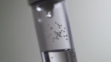 saline IV drip in slow-motion