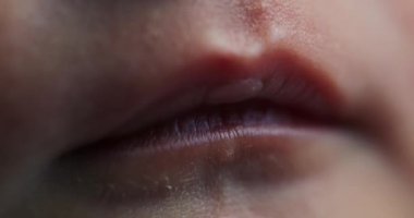 Macro close-up of newborn lips sleeping