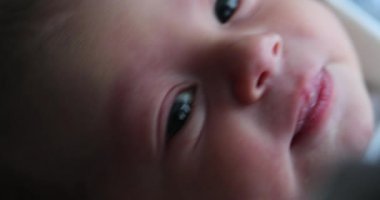 Newborn infant baby in first day of life after birth