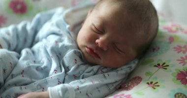 Newborn baby infant sleeping first week of life