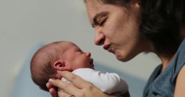 Mother and newborn baby interaction