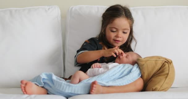 Sister Holding Newborn Baby Infant Brother Home — Stockvideo