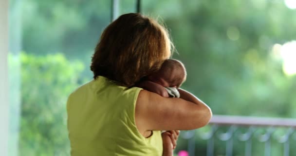 Candid Back Grand Mother Holding Newborn Baby Infant Grand Son — Video Stock