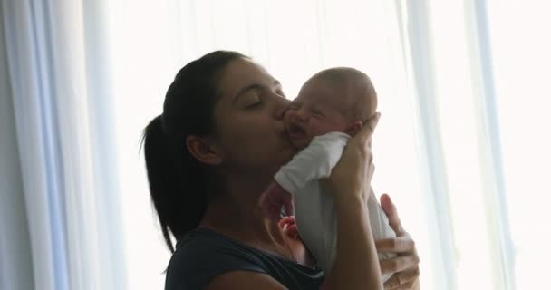 Mother Showing Love Affection Kissing Newborn Baby Infant Next Curtain — ストック動画