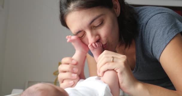 Mother Kissing Newborn Baby Feet Foot Showing Love Affection Baby — Wideo stockowe