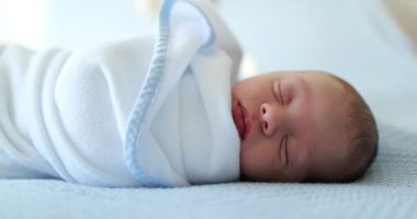 Beautiful newborn baby sleeping taking a nap