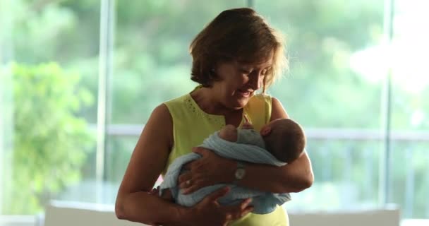 Happy Grand Mother Calming Holding Newborn Baby Arms — Stockvideo